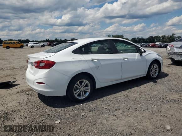 2019 Chevrolet Cruze LS с VIN 1G1BC5SM6K7102595, выставлен на аукционе Copart как лот 70303805 с пробегом 73 877 миль миль и Списание • Salvage title. История ставок и продаж доступна на DreamBid. Изображение 3.