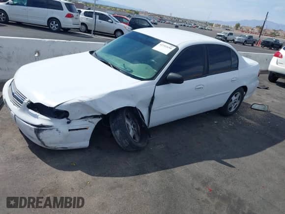 2005 Chevrolet Malibu Classic z VIN 1G1ND52F65M196561, wystawiony jako IAAI lot #42102650 z przebiegiem 181 949 mil mil oraz . Historia ofert i sprzedaży dostępna na DreamBid. Obrazek 13.