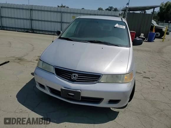 2001 Honda Odyssey LX с VIN 2HKRL18521H609633, выставлен на аукционе Copart как лот 59930615 с пробегом 237 134 миль миль и Списание • Salvage title. История ставок и продаж доступна на DreamBid. Изображение 14.