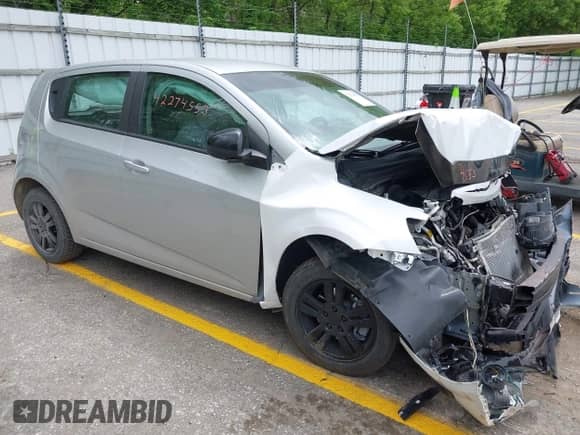 2012 Chevrolet Sonic LS with VIN 1G1JB6SH6C4153749, listed as a IAAI auction lot 42274553 with 165,248 mi miles and . Bid and sale history available at DreamBid. Image 1.