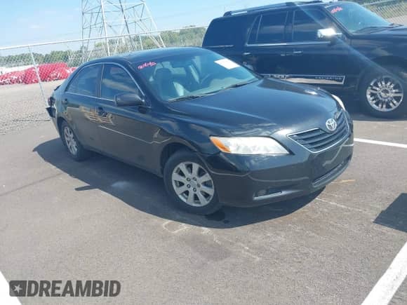 2007 Toyota Camry LE with VIN 4T1BK46K47U037277, listed as a IAAI auction lot 43351743 with 238,174 mi miles and . Bid and sale history available at DreamBid. Image 1.