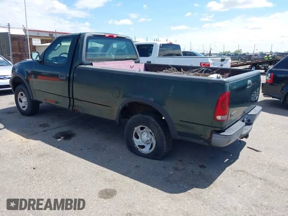 2002 Ford F-150 XL z VIN 1FTRF18232NB18258, wystawiony jako IAAI lot #42123898 z przebiegiem 152 214 mil mil oraz . Historia ofert i sprzedaży dostępna na DreamBid. Obrazek 3.