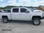 2018 Chevrolet Silverado 1500 LTZ z VIN 3GCUKSECXJG531357, wystawiony jako IAAI lot #42985211 z przebiegiem 107 353 mil mil oraz . Historia ofert i sprzedaży dostępna na DreamBid. Obrazek 13.