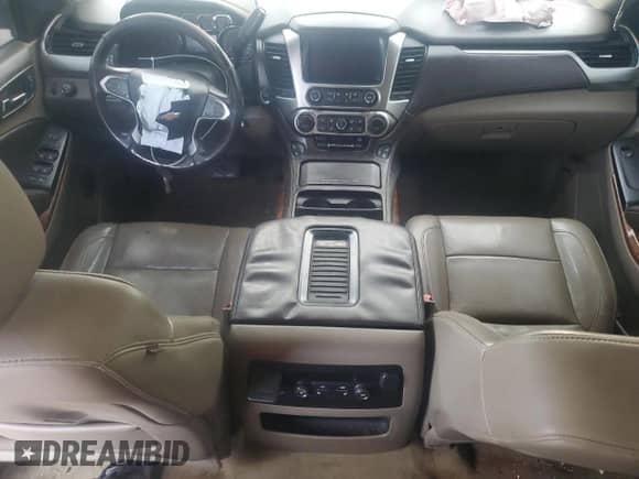 2015 Chevrolet Suburban LTZ with VIN 1GNSCKKCXFR571171, listed as a Copart auction lot 81972825 with 189,848 mi miles and Salvage title. Bid and sale history available at DreamBid. Image 8.