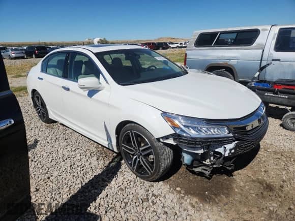 2016 Honda Accord Touring with VIN 1HGCR3F9XGA035273, listed as a Copart auction lot 81602745 with 49,879 mi miles and Salvage title. Bid and sale history available at DreamBid. Image 4.
