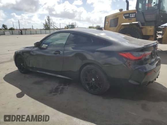 2022 BMW 4 Series 430i with VIN WBA53AP06NCJ71783, listed as a Copart auction lot 45195265 with 13,499 mi miles and Clean title. Bid and sale history available at DreamBid. Image 2.