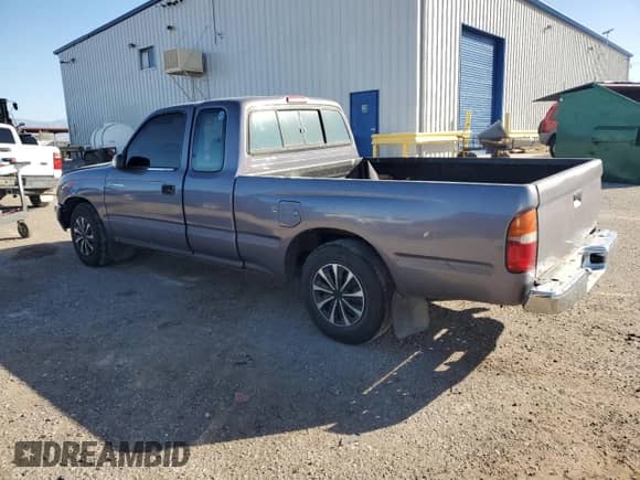 1997 Toyota Tacoma z VIN 4TAVN52N2VZ297347, wystawiony jako Copart lot #89669695 z przebiegiem 218 489 mil mil oraz Szkoda całkowita • Salvage title. Historia ofert i sprzedaży dostępna na DreamBid. Obrazek 2.
