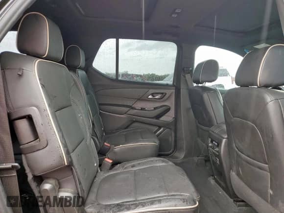 2023 Chevrolet Traverse Premier z VIN 1GNERKKW4PJ178661, wystawiony jako Copart lot #63104075 z przebiegiem 35 802 mil mil oraz Czysty tytuł • Clean title. Historia ofert i sprzedaży dostępna na DreamBid. Obrazek 11.