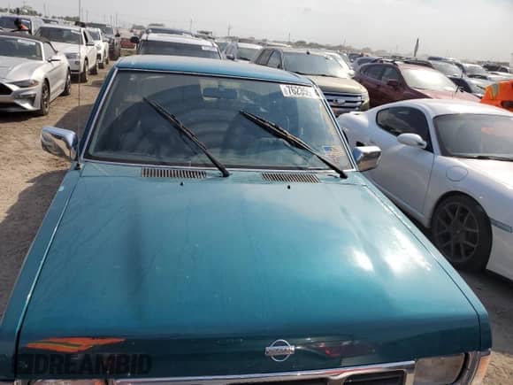 1995 Nissan Frontier XE with VIN 1N6HD16S3SC463075, listed as a Copart auction lot 76235934 with 122,466 mi miles and Salvage title. Bid and sale history available at DreamBid. Image 5.