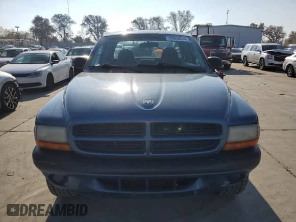 2003 Dodge Dakota with VIN 1D7GG32NX3S252020, listed as a Copart auction lot 83869424 with 258,061 mi miles and Salvage title. Bid and sale history available at DreamBid. Image 5.