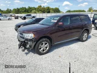 2012 Dodge Durango SXT with VIN 1C4RDJAG4CC181247, listed as a Copart auction lot 70698835 with 205,803 mi miles and Salvage title. Bid and sale history available at DreamBid. Image 1.