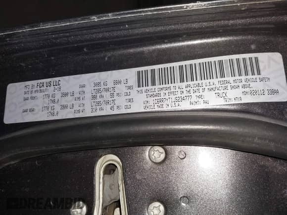 2018 Ram 1500 Rebel with VIN 1C6RR7YT1JS234777, listed as a IAAI auction lot 41409525 with 119,497 mi miles and . Bid and sale history available at DreamBid. Image 9.