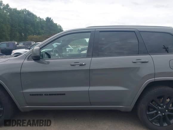 2020 Jeep Grand Cherokee Laredo E with VIN 1C4RJFAG6LC176718, listed as a IAAI auction lot 43043174 with 128,424 mi miles and . Bid and sale history available at DreamBid. Image 14.