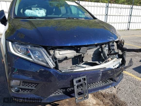 2019 Honda Odyssey EX-L with VIN 5FNRL6H76KB054460, listed as a IAAI auction lot 43404528 with 96,987 mi miles and . Bid and sale history available at DreamBid. Image 19.