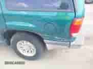 1998 Ford Explorer XL z VIN 1FMZU32X9WUD39036, wystawiony jako IAAI lot #42299559 z przebiegiem 159 909 mil mil oraz . Historia ofert i sprzedaży dostępna na DreamBid. Obrazek 6.