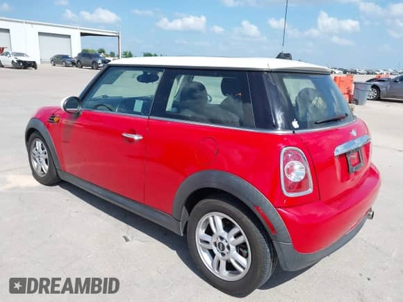 2012 MINI Hardtop with VIN WMWSU3C52CT542027, listed as a IAAI auction lot 42572780 with 122,496 mi miles and . Bid and sale history available at DreamBid. Image 3.