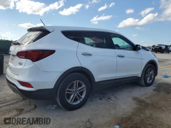 2018 Hyundai Santa Fe 2.4L с VIN 5NMZTDLB9JH060718, выставлен на аукционе Copart как лот 83770345 с пробегом 122 039 миль миль и Списание • Salvage title. История ставок и продаж доступна на DreamBid. Изображение 3.