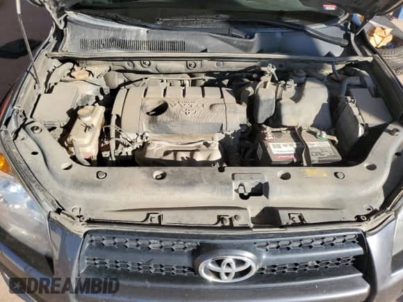2010 Toyota RAV4 Sport with VIN JTMRF4DV3A5030651, listed as a Copart auction lot 81797365 with 200,582 mi miles and Salvage title. Bid and sale history available at DreamBid. Image 12.