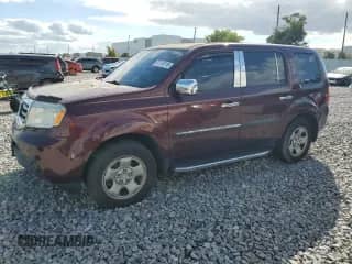 2015 Honda Pilot LX с VIN 5FNYF3H21FB020695, выставлен на аукционе Copart как лот 87176115 с пробегом 154 286 миль миль и Чистый • Clean title. История ставок и продаж доступна на DreamBid. Изображение 1.