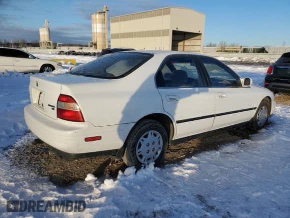 1995 Honda Accord LX z VIN 1HGCD5633SA075239, wystawiony jako Copart lot #41386425 z przebiegiem 244 611 mil mil oraz Szkoda całkowita • Salvage title. Historia ofert i sprzedaży dostępna na DreamBid. Obrazek 3.