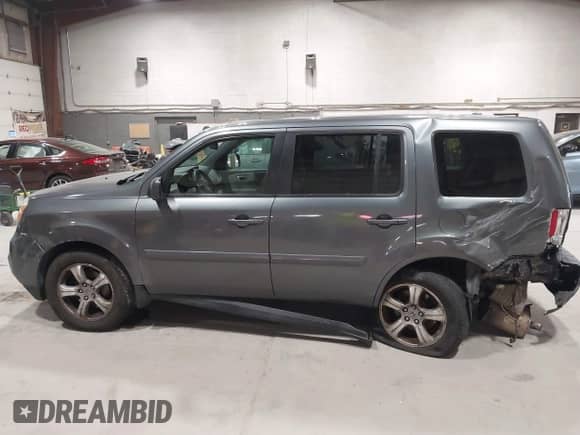 2013 Honda Pilot EX-L with VIN 5FNYF4H55DB033673, listed as a IAAI auction lot 43454478 with 215,014 mi miles and . Bid and sale history available at DreamBid. Image 14.