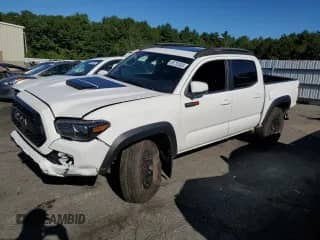 2019 Toyota Tacoma SR with VIN 5TFCZ5AN1KX205525, listed as a Copart auction lot 69732405 with 74,920 mi miles and Salvage title. Bid and sale history available at DreamBid. Image 1.