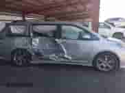 2014 Toyota Sienna SE with VIN 5TDXK3DC3ES495233, listed as a IAAI auction lot 43173582 with Not provided miles and . Bid and sale history available at DreamBid. Image 13.