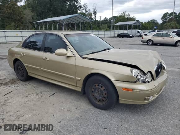 2004 Hyundai Sonata with VIN KMHWF25H74A052787, listed as a Copart auction lot 71840374 with 135,140 mi miles and Salvage title. Bid and sale history available at DreamBid. Image 4.