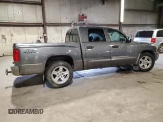 2007 Dodge Dakota Laramie with VIN 1D7HW58P77S270959, listed as a Copart auction lot 64900215 with 92,465 mi miles and Salvage title. Bid and sale history available at DreamBid. Image 3.