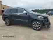 2017 Jeep Grand Cherokee Overland with VIN 1C4RJFCG8HC940430, listed as a Copart auction lot 68780995 with 150,371 mi miles and Salvage title. Bid and sale history available at DreamBid. Image 4.