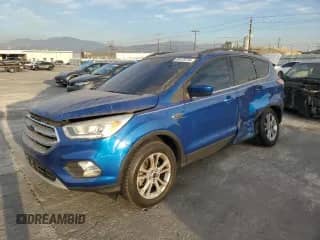 2017 Ford Escape SE с VIN 1FMCU9G9XHUA11145, выставлен на аукционе Copart как лот 86125734 с пробегом 106 846 миль миль и Чистый • Clean title. История ставок и продаж доступна на DreamBid. Изображение 1.