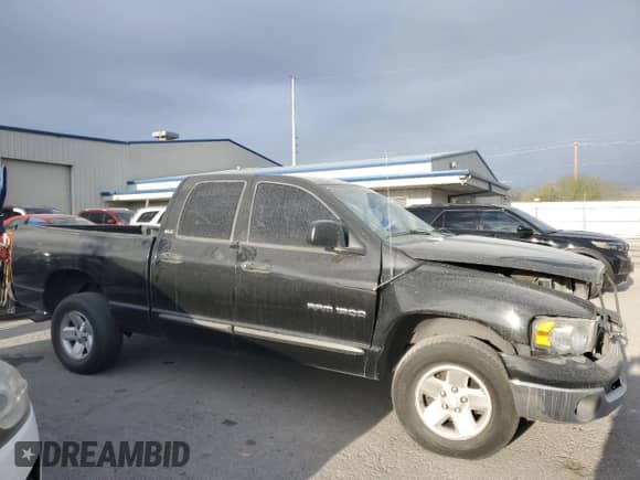 2002 Dodge 1500 with VIN 3D7HA18N42G111211, listed as a Copart auction lot 51679425 with 195,711 mi miles and Salvage title. Bid and sale history available at DreamBid. Image 4.