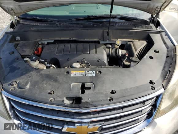 2015 Chevrolet Traverse LT с VIN 1GNKVGKD1FJ318657, выставлен на аукционе Copart как лот 64558425 с пробегом 235 344 миль миль и Списание • Salvage title. История ставок и продаж доступна на DreamBid. Изображение 12.