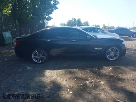 2014 BMW 7 Series 740i с VIN WBAYA6C52ED144477, выставлен на аукционе IAAI как лот 43191212 с пробегом 182 792 миль миль и . История ставок и продаж доступна на DreamBid. Изображение 13.