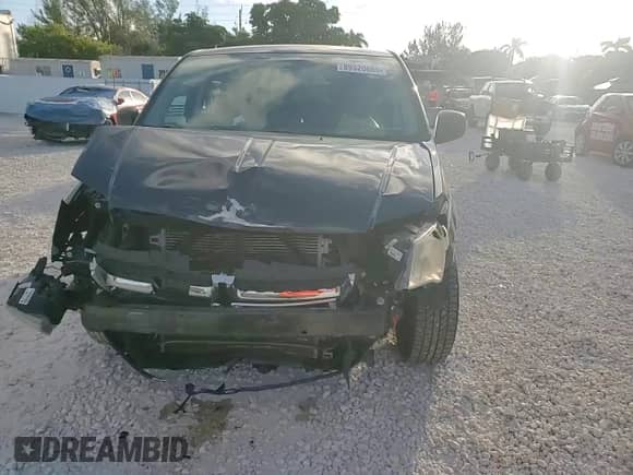 2014 Dodge Grand Caravan SE z VIN 2C4RDGBG0ER468676, wystawiony jako Copart lot #89520685 z przebiegiem 132 012 mil mil oraz Szkoda całkowita • Salvage title. Historia ofert i sprzedaży dostępna na DreamBid. Obrazek 14.