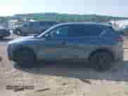 2023 Mazda CX-5 S Carbon Edition z VIN JM3KFBCM9P0211734, wystawiony jako IAAI lot #42439734 z przebiegiem 22 886 mil mil oraz . Historia ofert i sprzedaży dostępna na DreamBid. Obrazek 14.