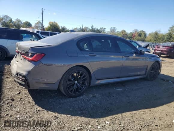 2022 BMW 7 Series 750i xDrive with VIN WBA7U2C0XNCK85433, listed as a Copart auction lot 74034664 with 26,050 mi miles and Salvage title. Bid and sale history available at DreamBid. Image 3.
