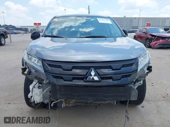 2023 Mitsubishi Outlander ES z VIN JA4ARUAU0PU016991, wystawiony jako IAAI lot #42406548 z przebiegiem 25 351 mil mil oraz . Historia ofert i sprzedaży dostępna na DreamBid. Obrazek 12.