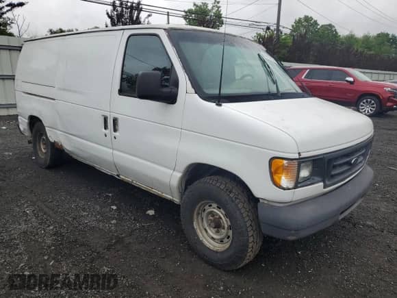 2003 Ford Econoline Cargo с VIN 1FTRE14263HA21595, выставлен на аукционе Copart как лот 58890705 с пробегом 164 237 миль миль и Списание • Salvage title. История ставок и продаж доступна на DreamBid. Изображение 4.