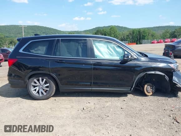 2020 Honda Pilot EX-L z VIN 5FNYF6H57LB033099, wystawiony jako IAAI lot #42588491 z przebiegiem 135 945 mil mil oraz . Historia ofert i sprzedaży dostępna na DreamBid. Obrazek 14.