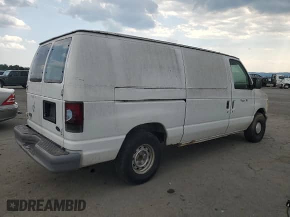 1999 Ford Econoline Cargo z VIN 1FTRE1427XHA24379, wystawiony jako Copart lot #63539135 z przebiegiem 91 158 mil mil oraz Czysty tytuł • Clean title. Historia ofert i sprzedaży dostępna na DreamBid. Obrazek 3.
