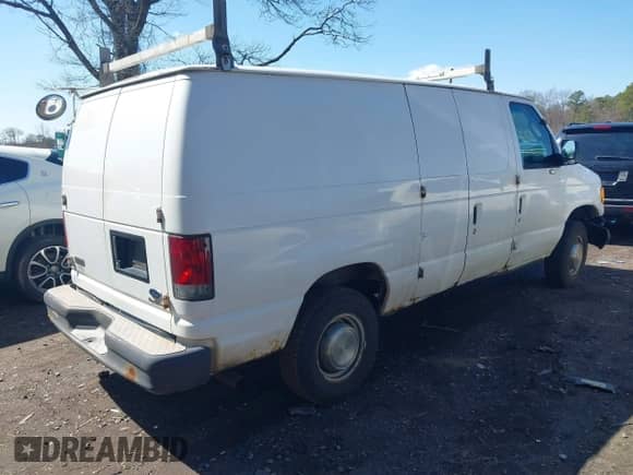 2003 Ford Econoline Cargo with VIN 1FTNE24LX3HA42513, listed as a IAAI auction lot 41858493 with 316,475 mi miles and . Bid and sale history available at DreamBid. Image 4.