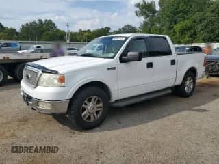 2004 Ford F-150 XLT with VIN 1FTPW12524KA53109, listed as a Copart auction lot 69801725 with 183,433 mi miles and Salvage title. Bid and sale history available at DreamBid. Image 1.