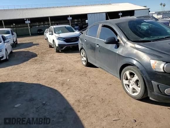 2013 Chevrolet Sonic LTZ с VIN 1G1JE5SH7D4226596, выставлен на аукционе Copart как лот 40272184 с пробегом 150 981 миль миль и Списание • Salvage title. История ставок и продаж доступна на DreamBid. Изображение 12.