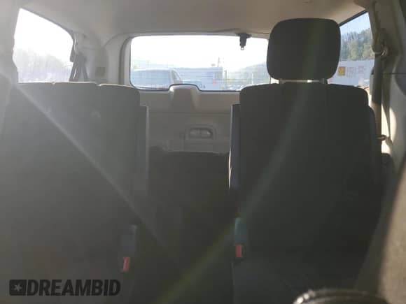 2013 Dodge Grand Caravan SXT with VIN 2C4RDGCG1DR575507, listed as a Copart auction lot 80065985 with 185,478 mi miles and Salvage title. Bid and sale history available at DreamBid. Image 10.