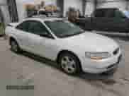 2000 Honda Accord EX с VIN 1HGCG2256YA019768, выставлен на аукционе Copart как лот 69843445 с пробегом 155 320 миль миль и Списание • Salvage title. История ставок и продаж доступна на DreamBid. Изображение 4.