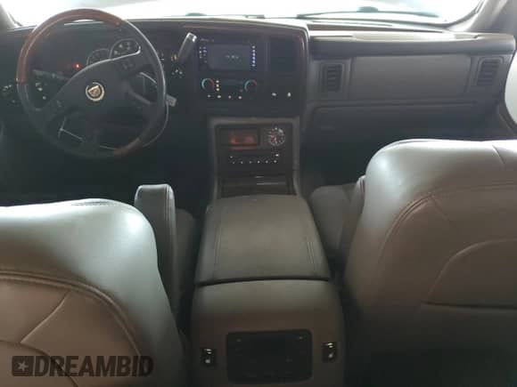 2004 Cadillac Escalade ESV z VIN 3GYFK66NX4G205380, wystawiony jako Copart lot #64630695 z przebiegiem 142 665 mil mil oraz Czysty tytuł • Clean title. Historia ofert i sprzedaży dostępna na DreamBid. Obrazek 8.