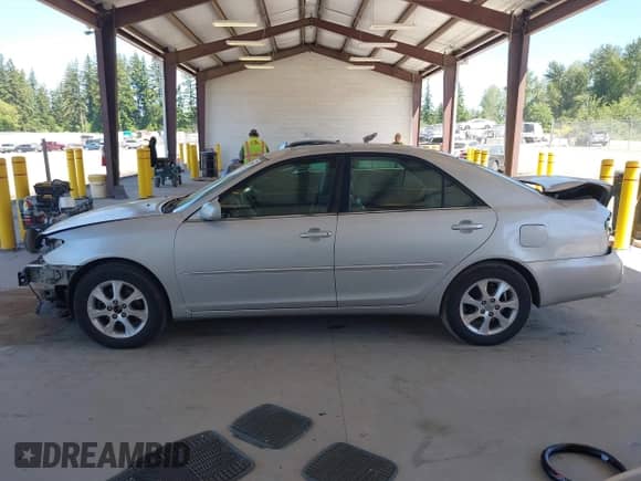 2005 Toyota Camry LE with VIN 4T1BF30K05U611555, listed as a IAAI auction lot 42349609 with 249,493 mi miles and . Bid and sale history available at DreamBid. Image 15.