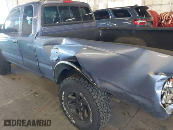 2000 Toyota Tacoma with VIN 4TAWM72N5YZ650056, listed as a IAAI auction lot 41680278 with 257,819 mi miles and . Bid and sale history available at DreamBid. Image 12.