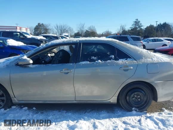 2014 Toyota Camry SE with VIN 4T1BK1FK6EU026342, listed as a IAAI auction lot 41246628 with 142,586 mi miles and . Bid and sale history available at DreamBid. Image 14.